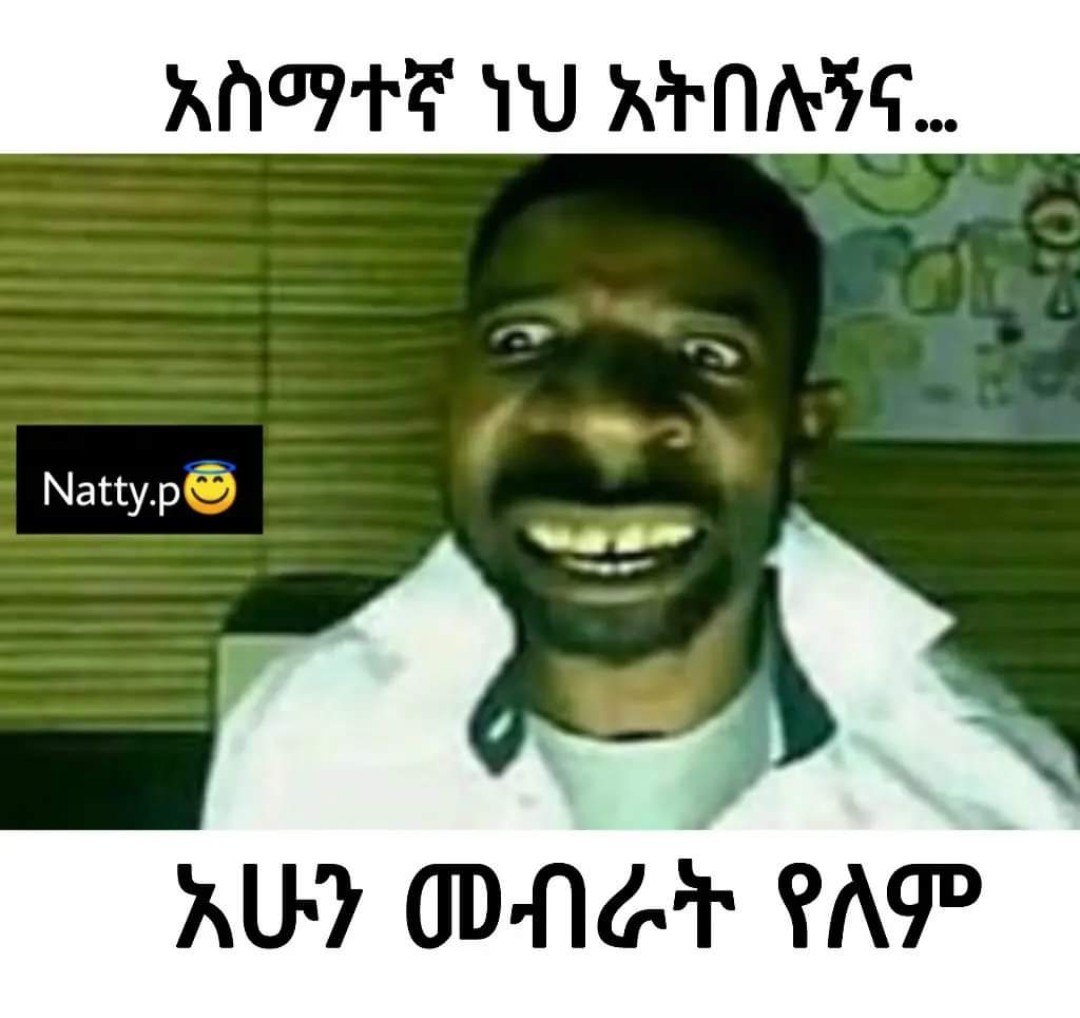 a man with a mustache and a smile